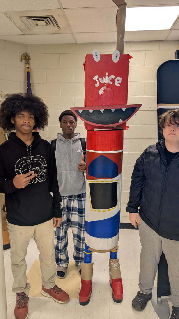 Students and their Exquisite Corpse sculptures