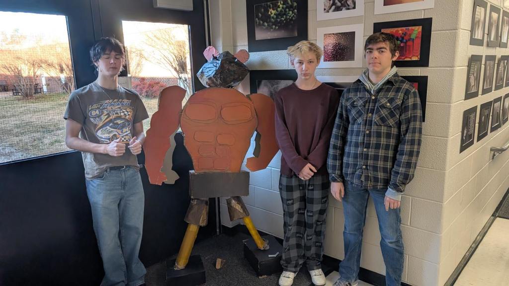 Students and their Exquisite Corpse sculptures