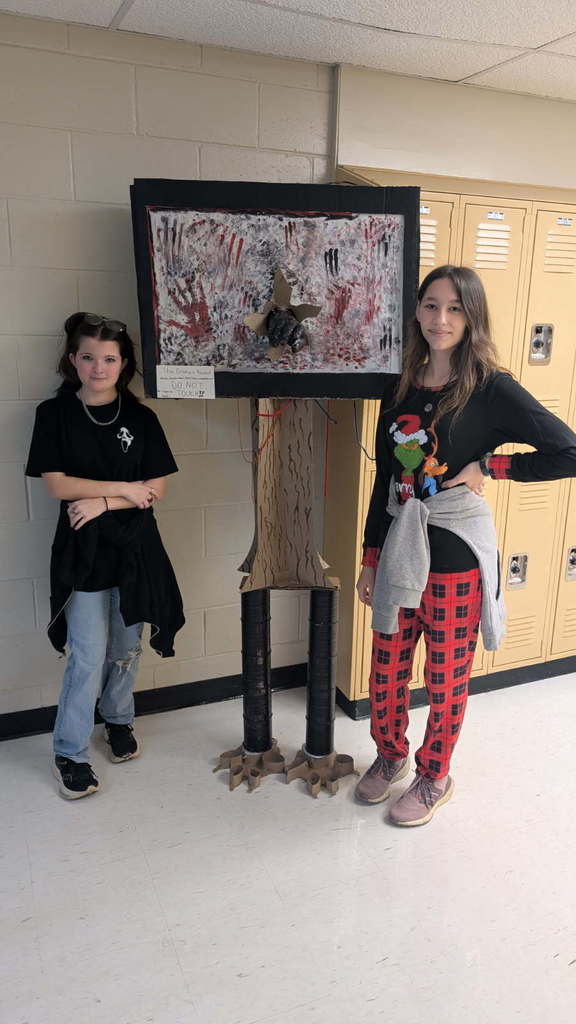 Students and their Exquisite Corpse sculptures