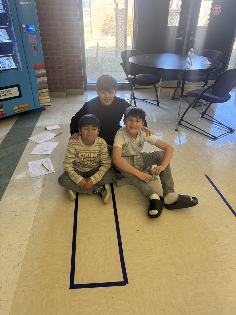 Mrs. Madison's class investigated area using tape & the floor tiles!