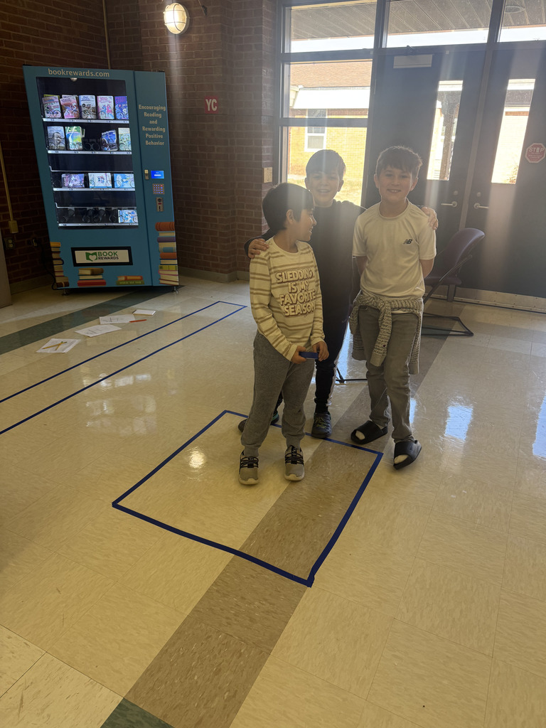 Mrs. Madison's class investigated area using tape & the floor tiles!