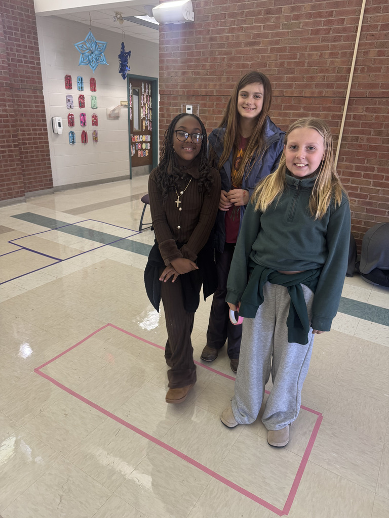 Mrs. Madison's class investigated area using tape & the floor tiles!