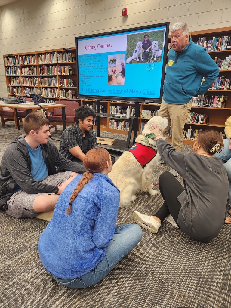 Rudee and Ron talking about Caring Canines
