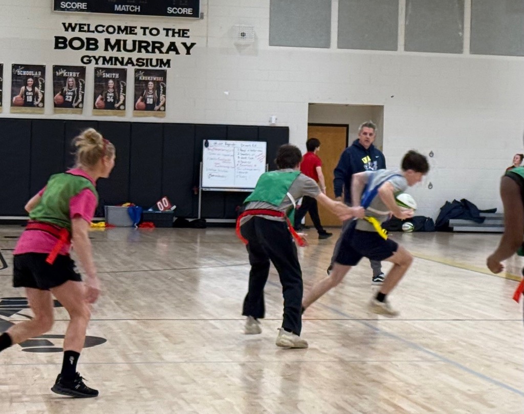 Sports and Rec Class learning Rugby