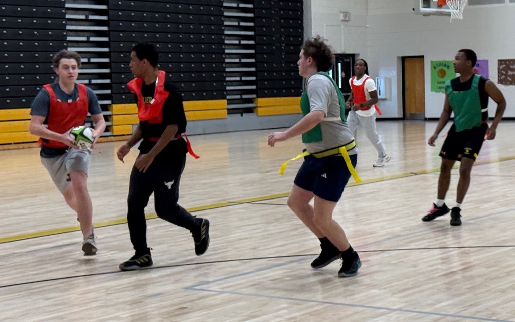 Sports and Rec Class learning Rugby