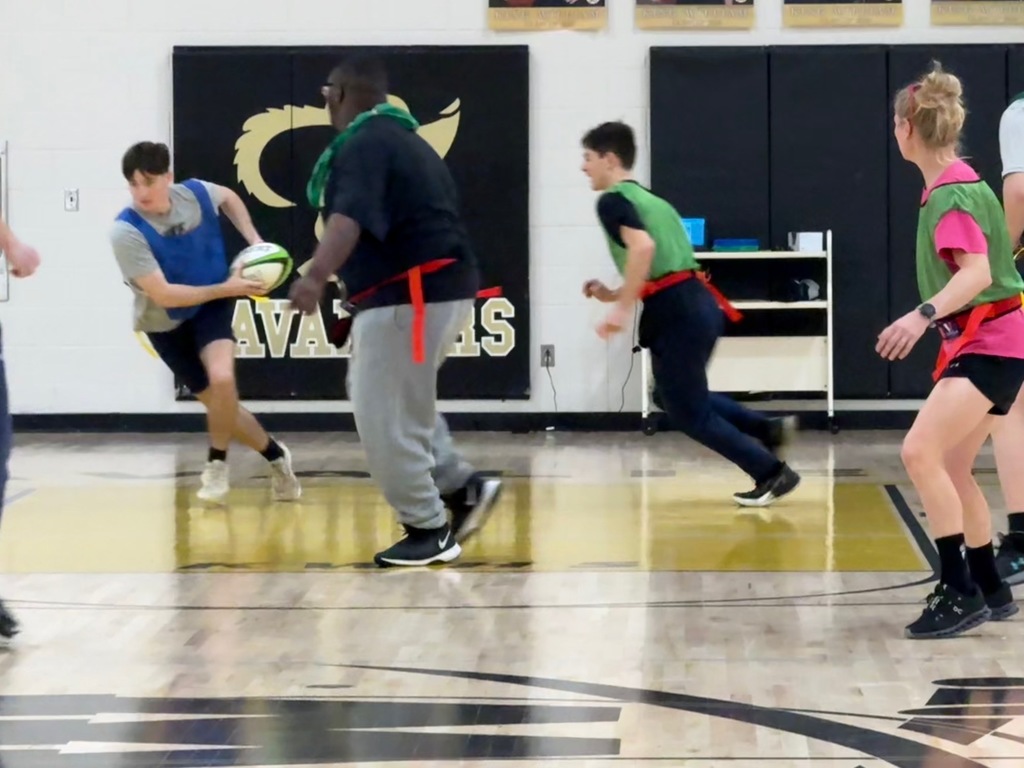 Sports and Rec Class learning Rugby