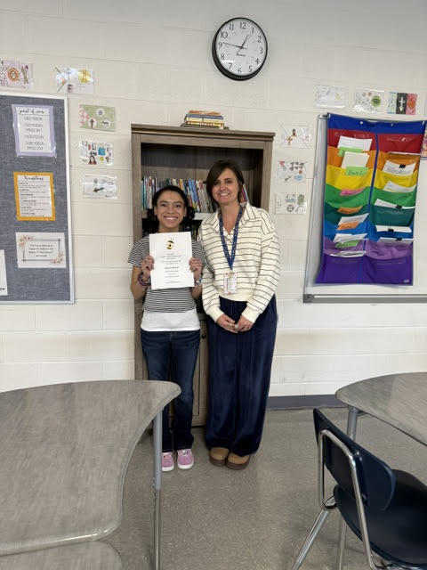 Spelling Bee Champion Zoey Freeman and her English Teacher Mrs. Diana Muntean