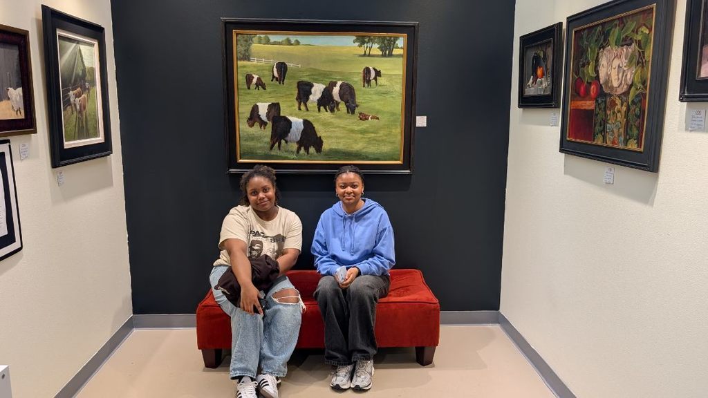 Students in front of local art work at Crossroads Art Center