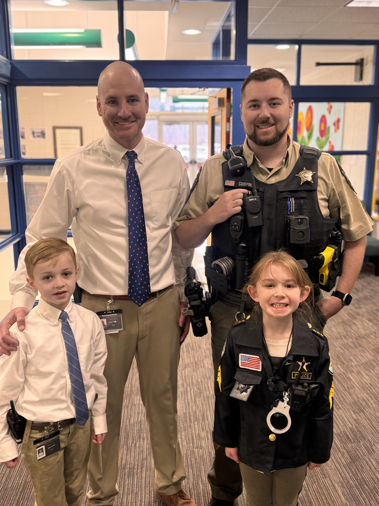 2 students dressed like a staff member