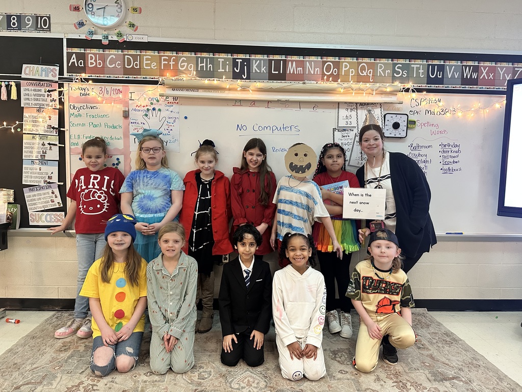 A teacher and her students dressed for Book Character Day!