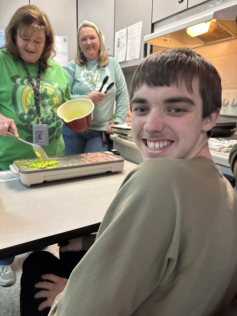 Students preparing green eggs and ham