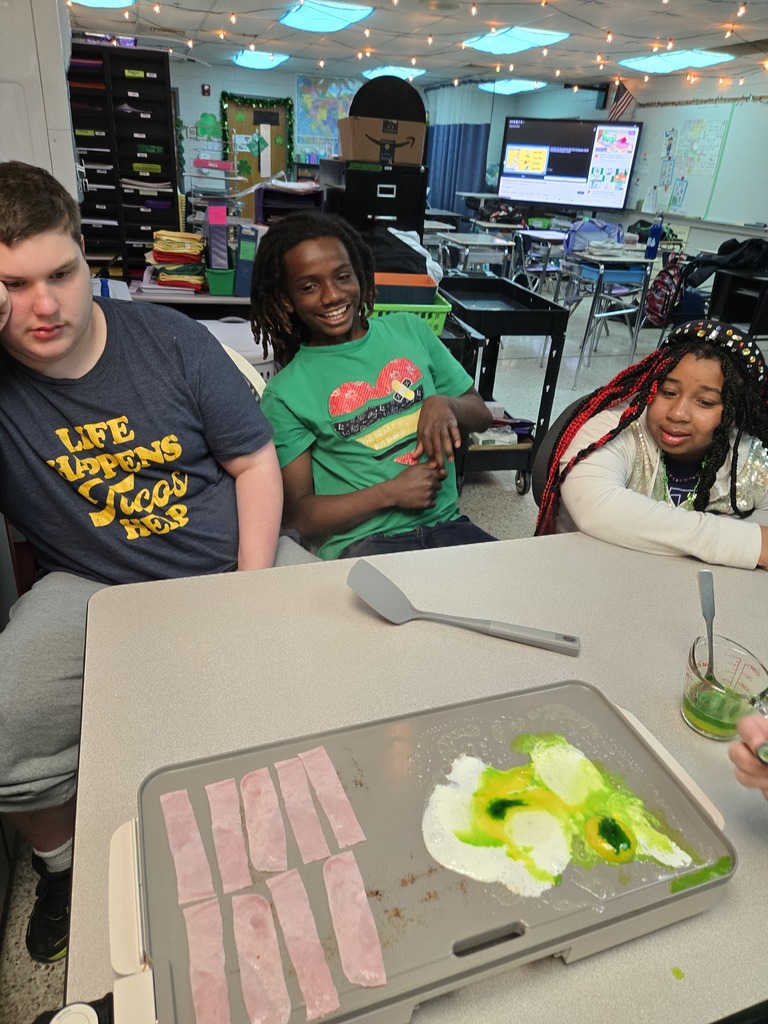 Students eating green eggs and ham