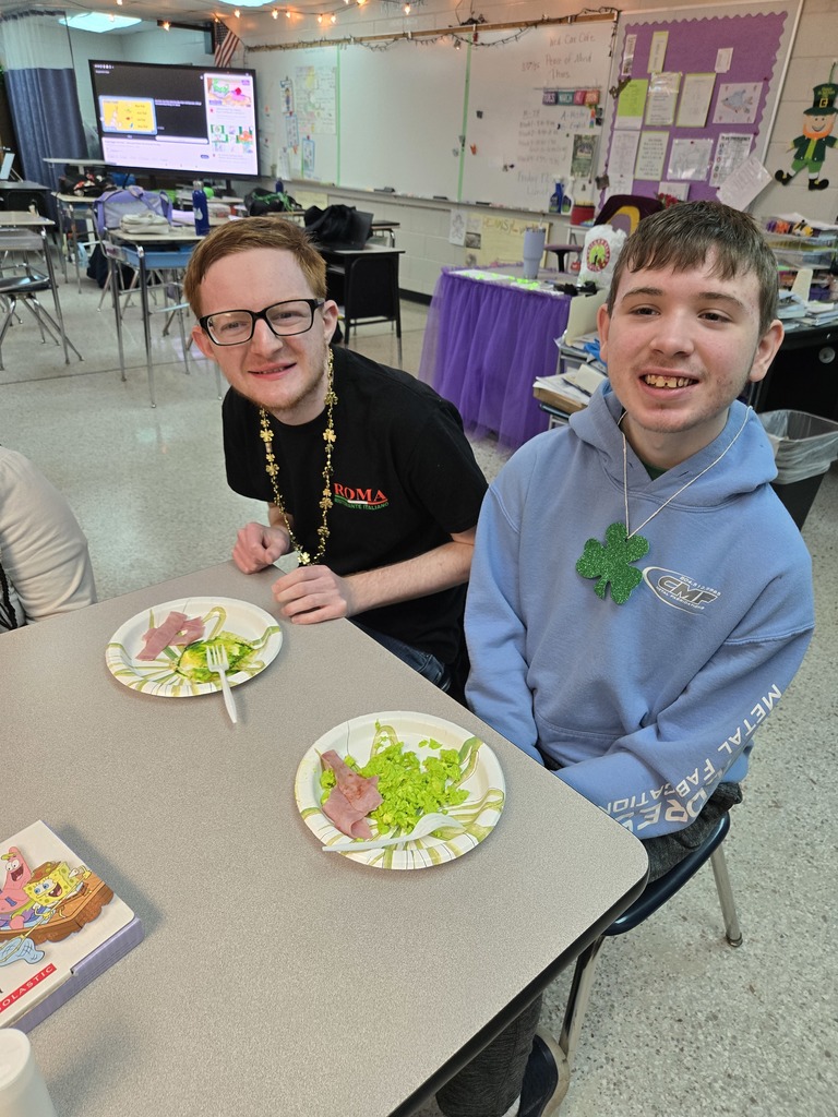 Students eating green eggs and ham