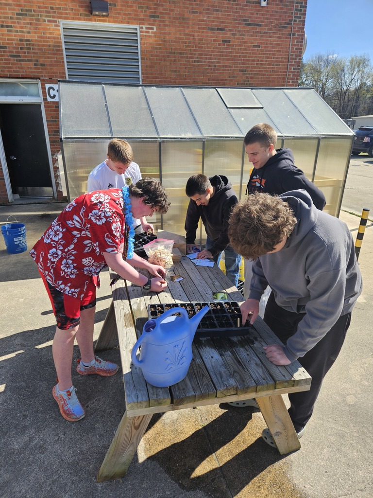 KWHS students planting seeds
