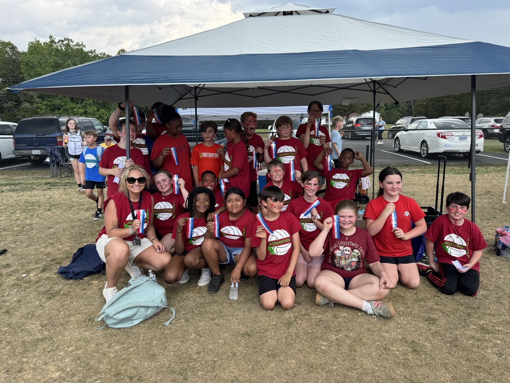 Students showiung off their field day ribbons