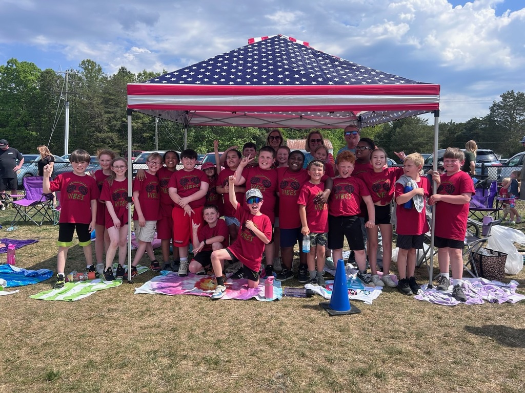 Tug of way champs pose for a picture.