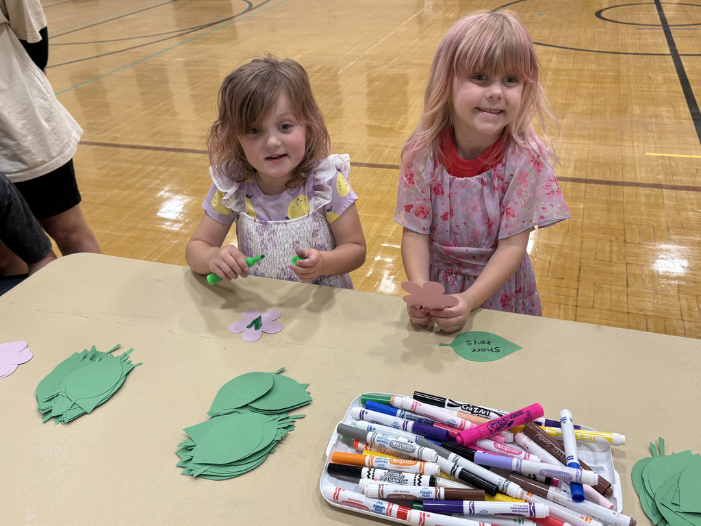 Two girls making crafts