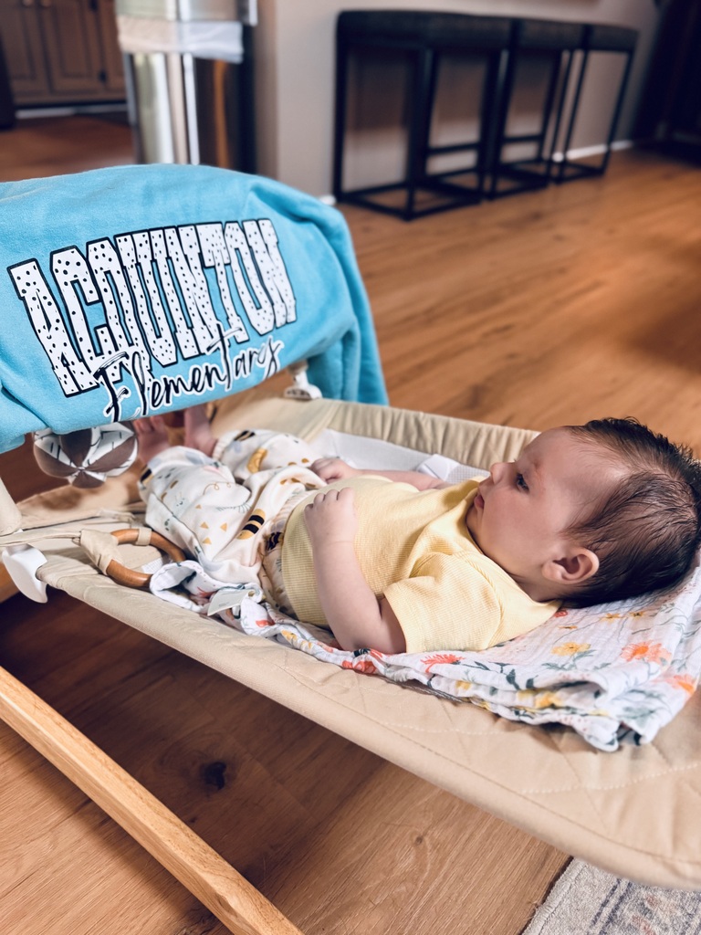 Baby with AES shirt