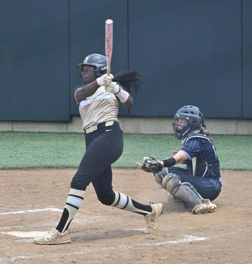 Softball player at bat at state game
