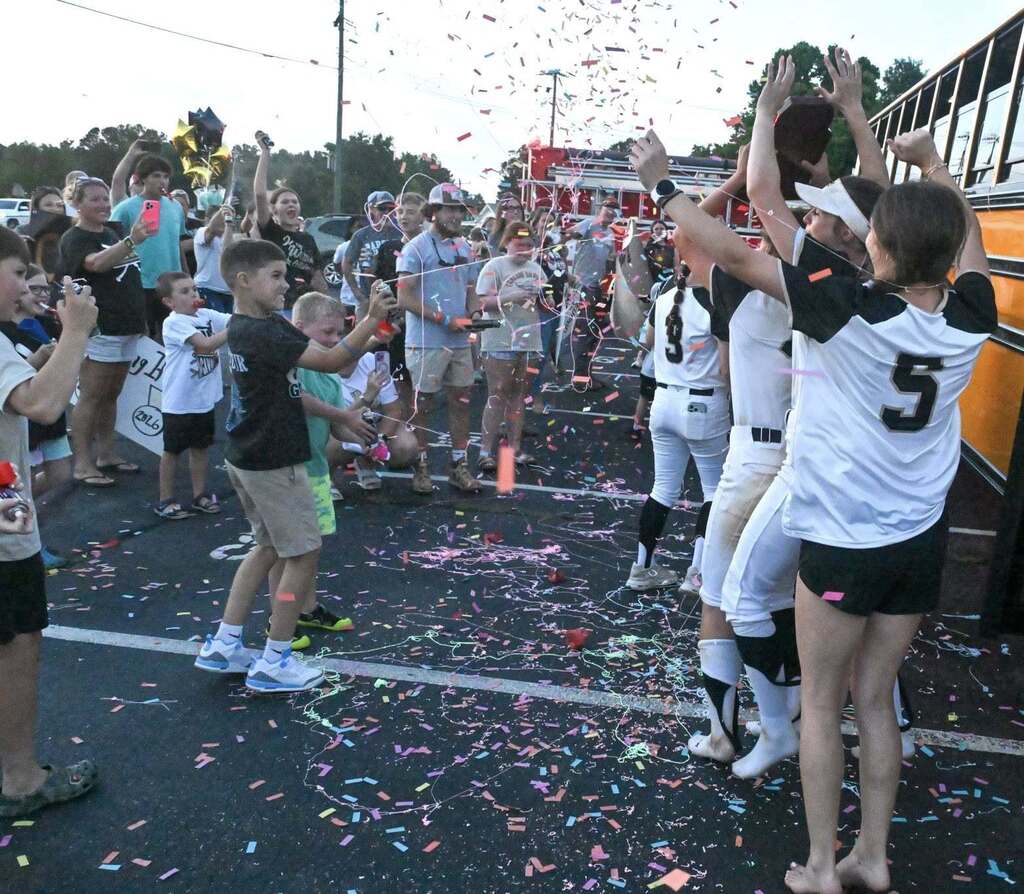 Softball team celebrates their win