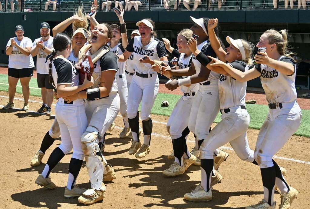 Softball team celebrates their win