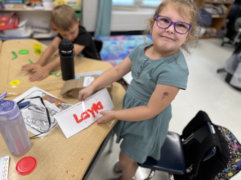 Student showing off their class work.