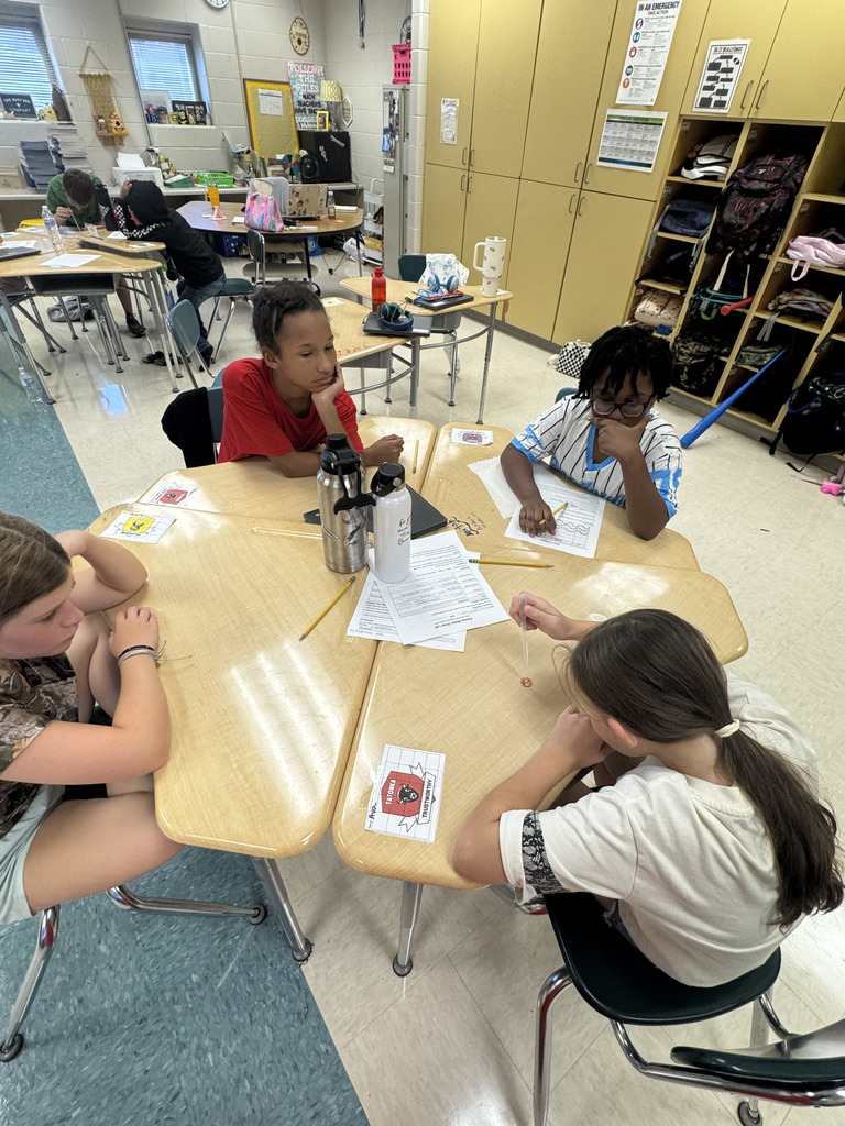 Students collaborating on classwork.