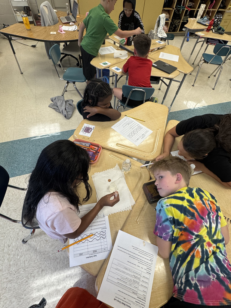 Students collaborating on classwork.