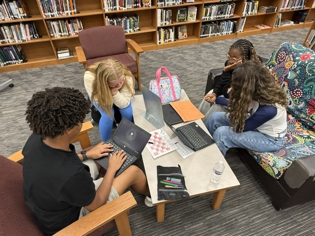 Students working on a calendar for Algebra class