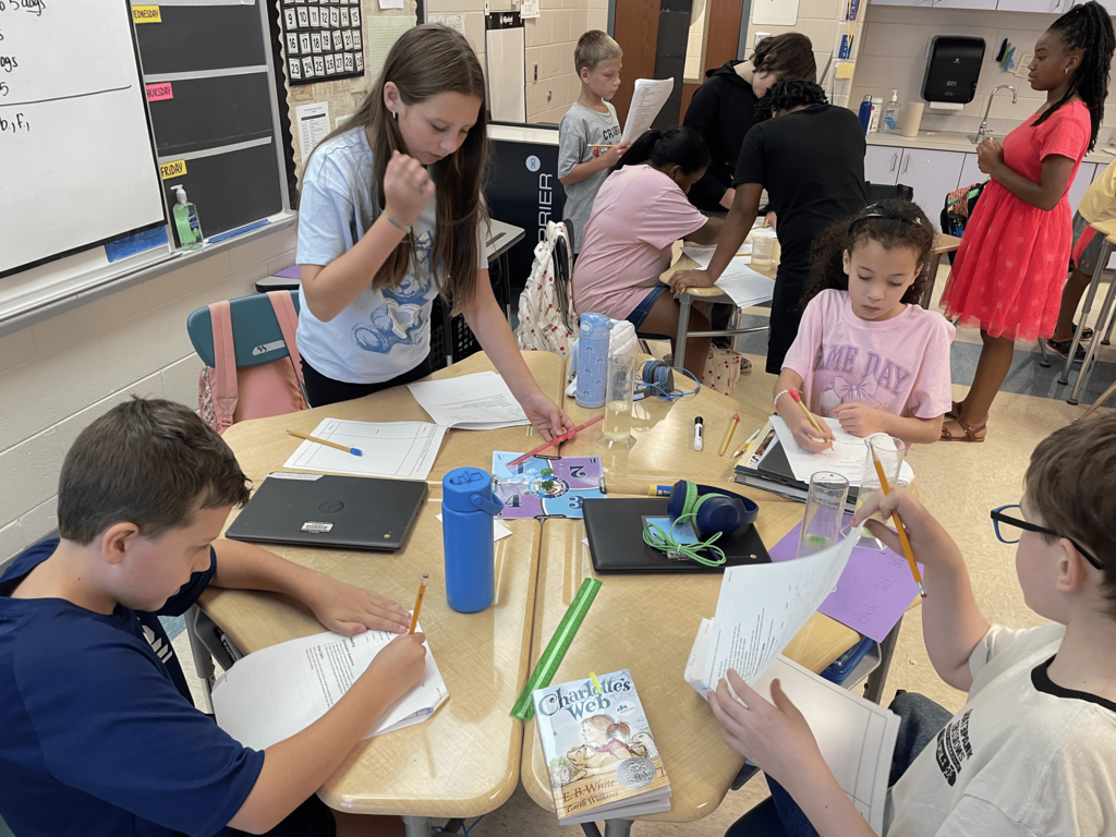 Students completing an experiment in science class.