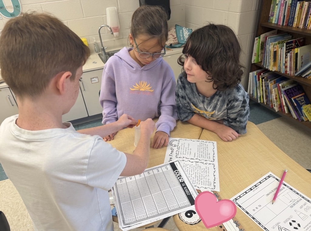 Students "save" their gummy worm using 4 paperclips and a lifesaver.