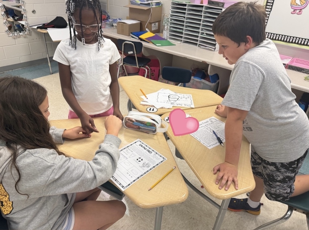 Students "save" their gummy worm using 4 paperclips and a lifesaver.