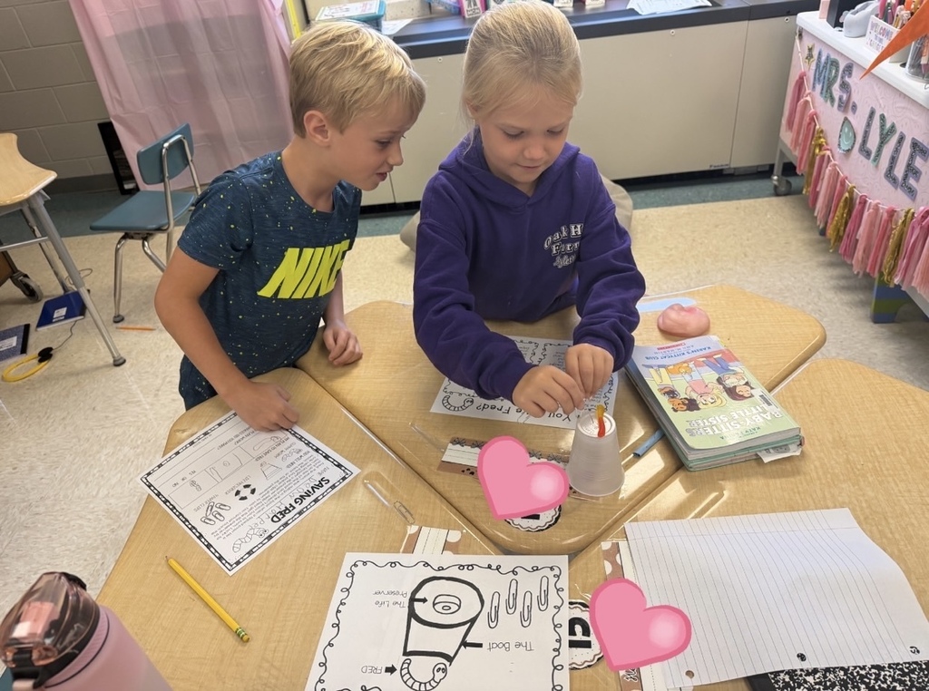 Students "save" their gummy worm using 4 paperclips and a lifesaver.