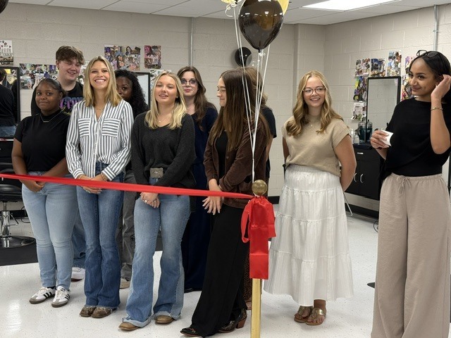 Ribbon cutting at our new school salon