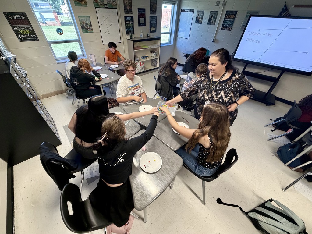 Geometry students play an academic game with M&M's.