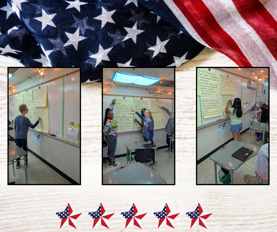 Students signing their classroom constitution
