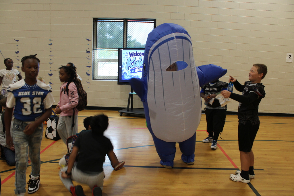Kuleana Whale socializing with students