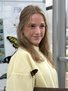 Butterfly on a student's shirt