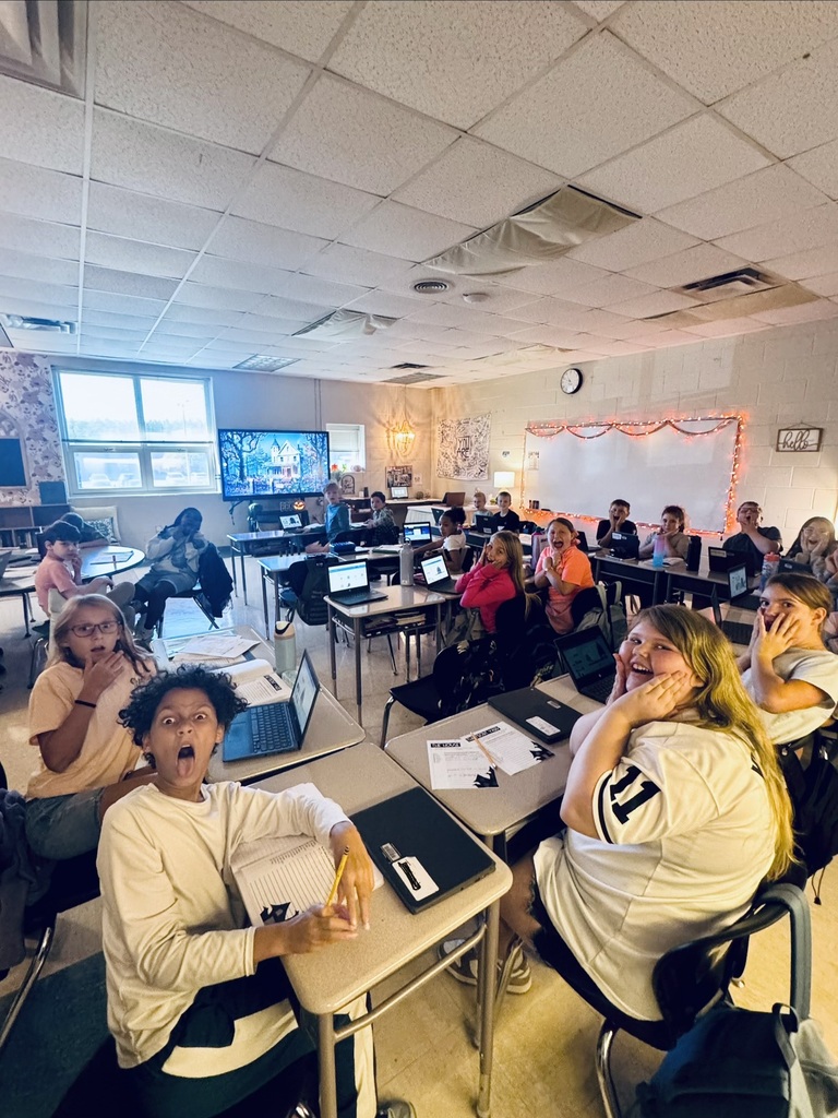 Class posing scared for a picture.