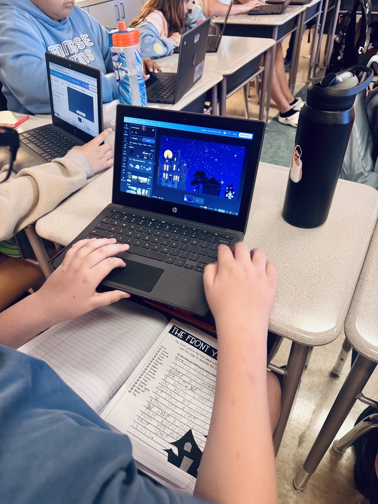 Students completing a spooky persuasive writing assignment.