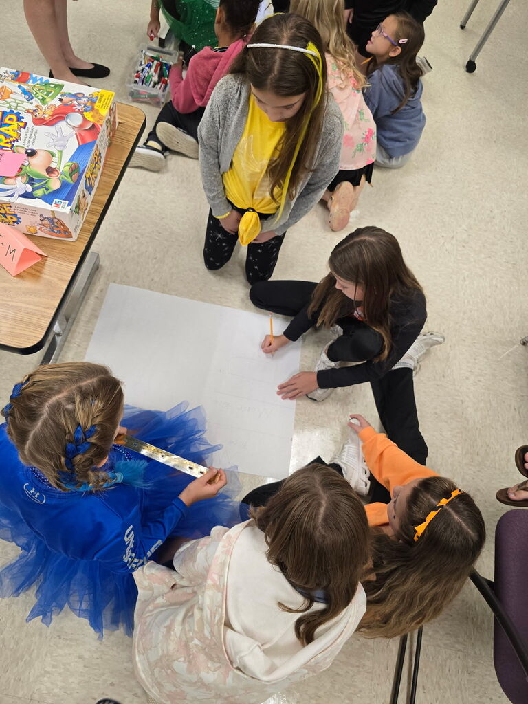 The Logical Ladies explore a Rube Goldberg machine using the game, Mouse Trap.