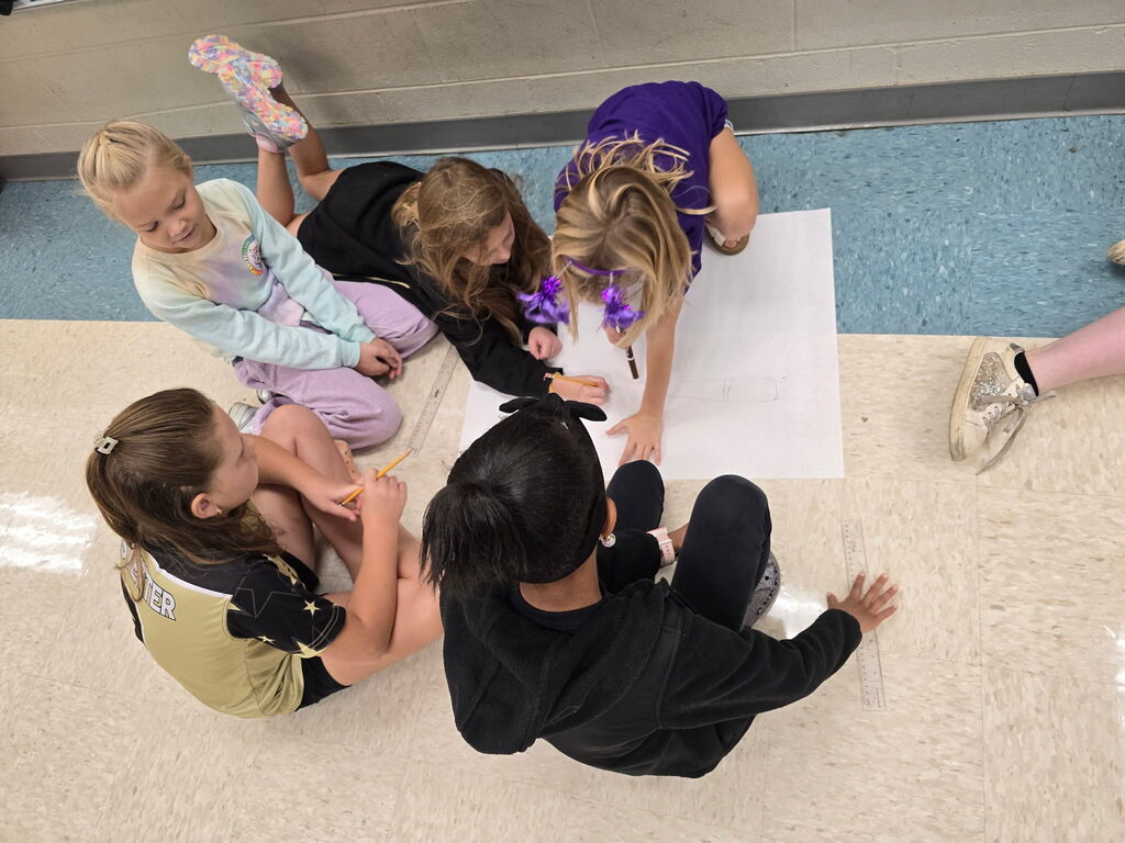The Logical Ladies explore a Rube Goldberg machine using the game, Mouse Trap.