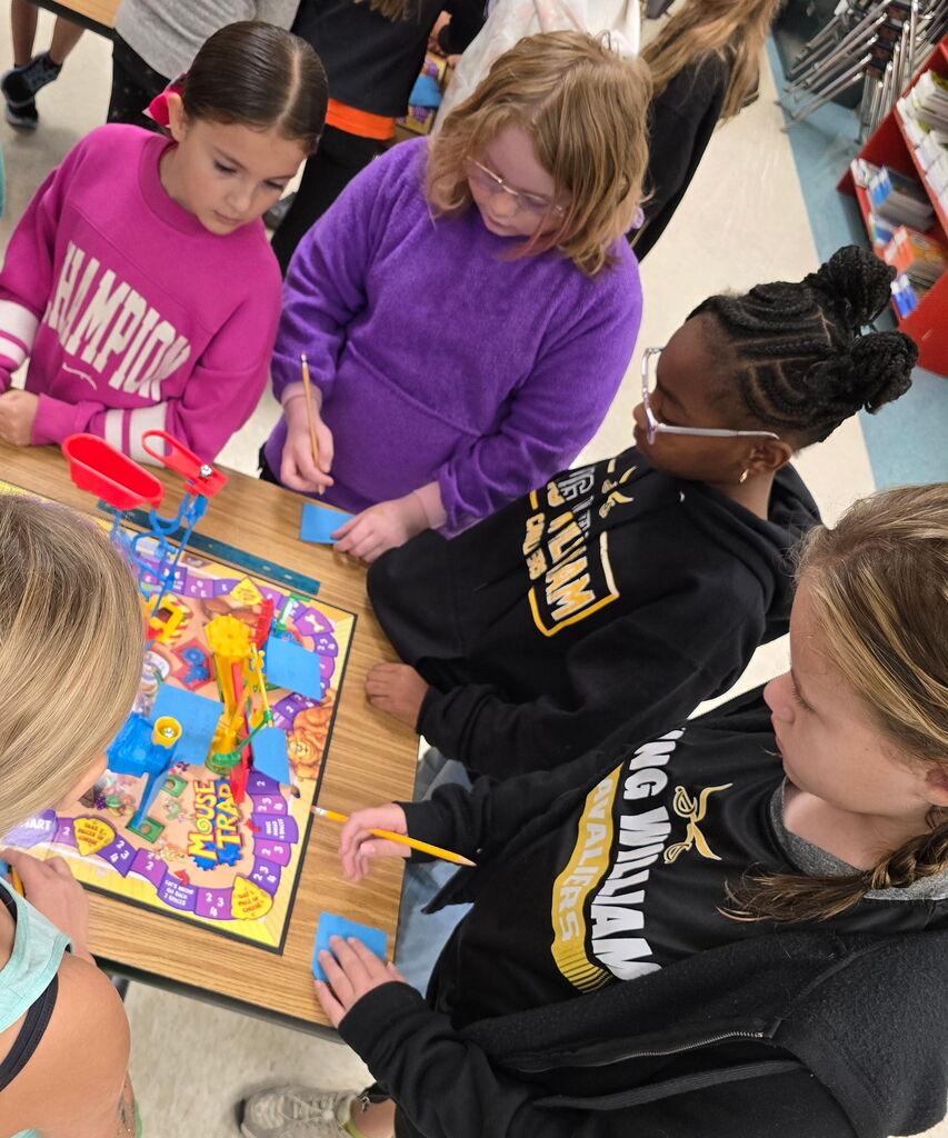 The Logical Ladies explore a Rube Goldberg machine using the game, Mouse Trap.