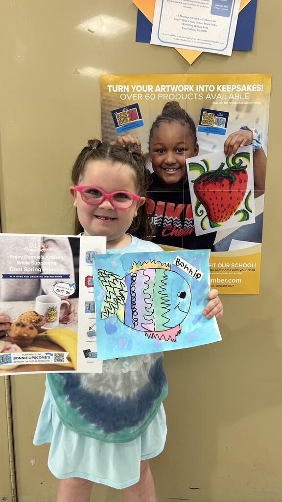 Students showing off art work.