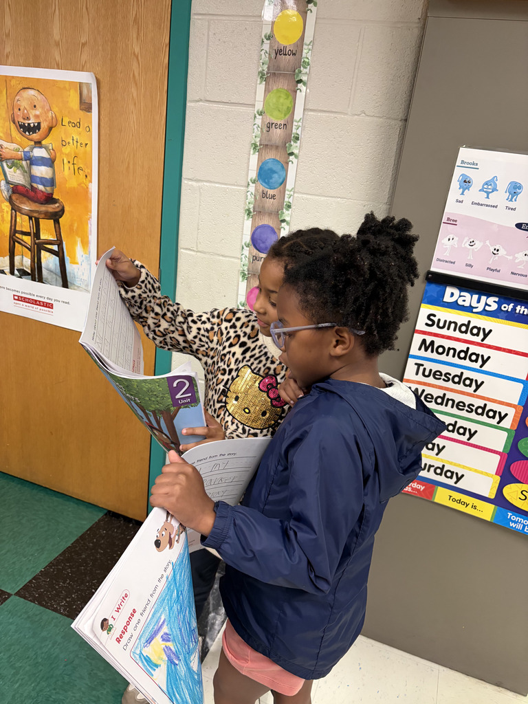 Students reading to each other