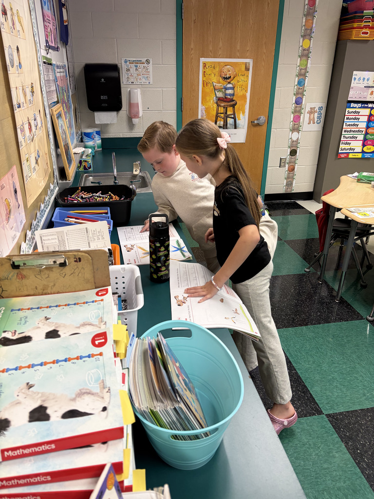 Students reading to each other