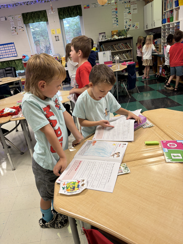 Students reading to each other