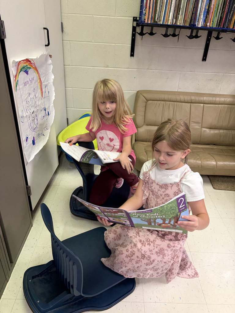 Students reading to each other