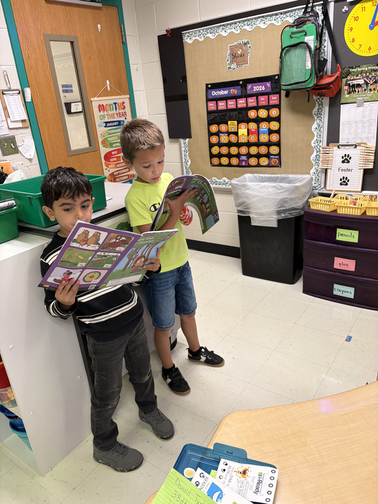 Students reading to each other