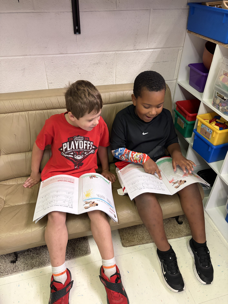 Students reading to each other